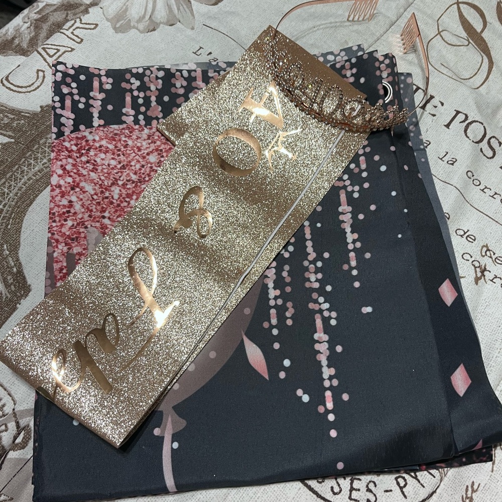 Glittery Gold XO Sash and Pink and black 40th birthday backdrop and Tiara.